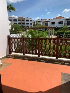 een houten hek voor een gebouw bij Luxurious Beachfront Villa with Private Pool - Sultan Palace in Kilifi