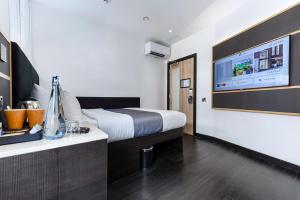 Postel nebo postele na pokoji v ubytování The Z Hotel Strand