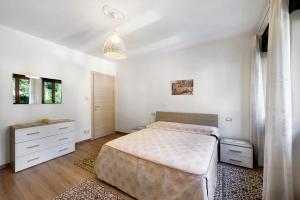 Postel nebo postele na pokoji v ubytování Chez Sabrina