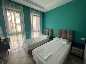 Postel nebo postele na pokoji v ubytování CD Villa