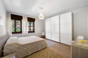 Postel nebo postele na pokoji v ubytování Chez Sabrina