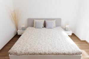 Ένα ή περισσότερα κρεβάτια σε δωμάτιο στο Diamond residence in old town with free parking