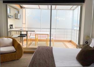 Postel nebo postele na pokoji v ubytování Hotel Apartamentos Regency La Feria