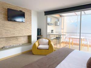 TV a/nebo společenská místnost v ubytování Hotel Apartamentos Regency La Feria
