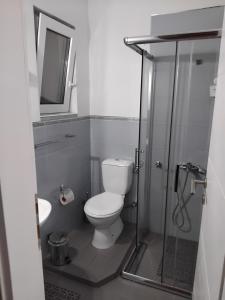 Un baño de APARTMANI PERGOLO Centar 19 fotos más