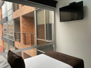 TV a/nebo společenská místnost v ubytování Hotel Apartamentos Regency La Feria