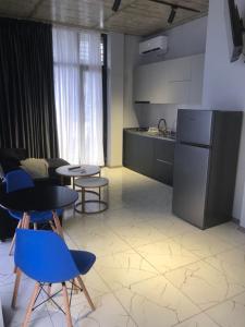 Kuchyň nebo kuchyňský kout v ubytování Blue Horizon Apartments
