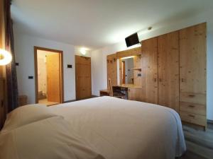 Postel nebo postele na pokoji v ubytování Hotel Cielo Blú
