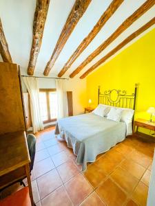 Posteľ alebo postele v izbe v ubytovaní Casa Piedralén