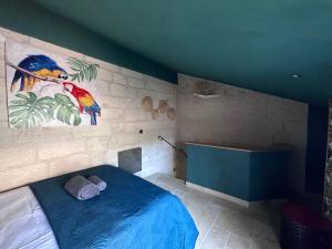 Posteľ alebo postele v izbe v ubytovaní Le 6 Bis by Les Cailloux Dorés