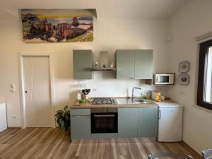 Køkken eller tekøkken på Taormina Miramare Home