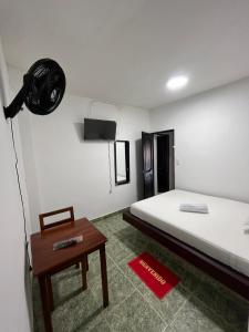 Postel nebo postele na pokoji v ubytování Hotel Melemar