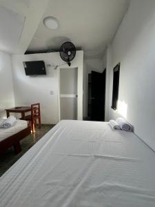 Postel nebo postele na pokoji v ubytování Hotel Melemar