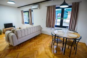 Χώρος καθιστικού στο Make Inn Apartments