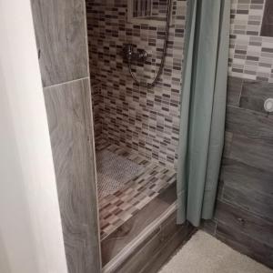 a shower with a glass door in a bathroom at Casa Vacanza Altamura in Altamura +14 photos