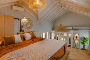 Postel nebo postele na pokoji v ubytování Braunis Horio Villas + 37 fotografií