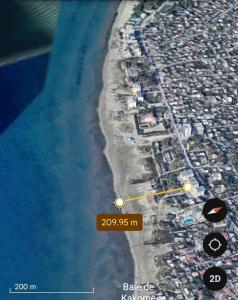 an aerial view of a beach and the ocean at Emigres Apartments Vlore in Vlorë
