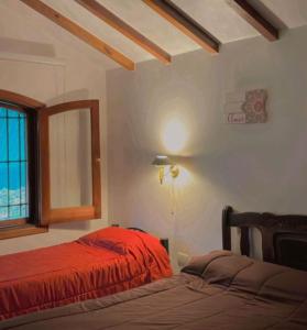 Postel nebo postele na pokoji v ubytování Complejo de alojamiento kempes Córdoba