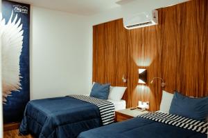 Postel nebo postele na pokoji v ubytování Sky Inn Hotel - Cancun