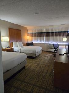 Postel nebo postele na pokoji v ubytování DoubleTree by Hilton Rochester