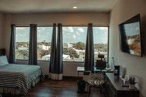 Postel nebo postele na pokoji v ubytování Sky Inn Hotel - Cancun