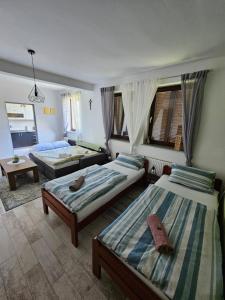 Postel nebo postele na pokoji v ubytování Studio apartman Dora