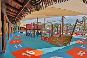 a childrens playground with a play area with at Atlantique Holiday Club - All Inclusive in Kuşadası