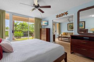 En eller flere senge i et værelse på MBH109 Charming & Updated Maui Banyan 2 Bath + 25 billeder