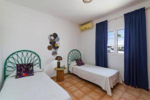 Postel nebo postele na pokoji v ubytování Villa Laurona by Villa Plus + 22 fotografií