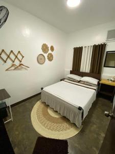 Postel nebo postele na pokoji v ubytování Hiraya Homestay Coron + 97 fotografií