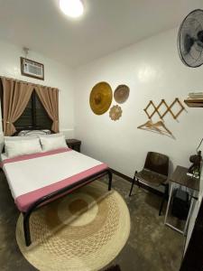 Postel nebo postele na pokoji v ubytování Hiraya Homestay Coron