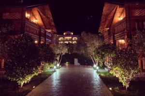 Κήπος έξω από το Apart Hotel Llolla