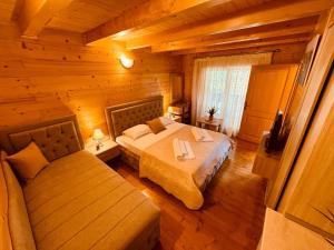 Ένα ή περισσότερα κρεβάτια σε δωμάτιο στο Apart Hotel Llolla