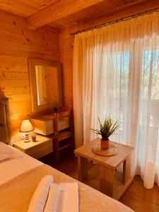 Ένα ή περισσότερα κρεβάτια σε δωμάτιο στο Apart Hotel Llolla