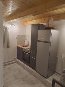 Kuchyň nebo kuchyňský kout v ubytování Apartment Cvita