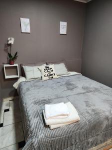 Ivy House Apart Hotel客房内的一张或多张床位