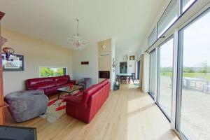 Una televisión o centro de entretenimiento en Villa contemporaine, paisible, tout confort