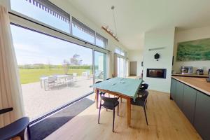 Una cocina o kitchenette en Villa contemporaine, paisible, tout confort