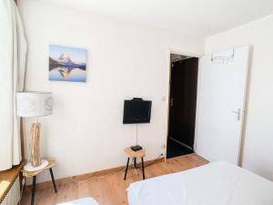 Posteľ alebo postele v izbe v ubytovaní Résidence Prariond B - 2 pièces accès direct sur les pistes MAE-2584