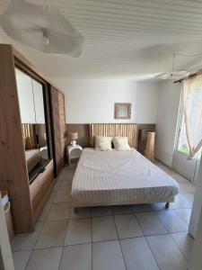 Postel nebo postele na pokoji v ubytování Maison Victoire