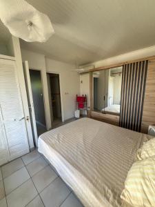 Postel nebo postele na pokoji v ubytování Maison Victoire