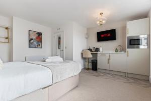 Ένα ή περισσότερα κρεβάτια σε δωμάτιο στο Bowles Hotels
