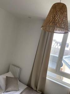 Ένα ή περισσότερα κρεβάτια σε δωμάτιο στο Le Bohème studio central