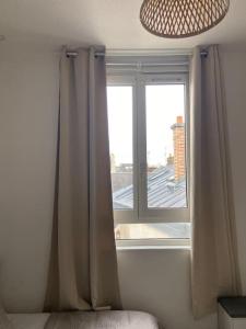 Ένα ή περισσότερα κρεβάτια σε δωμάτιο στο Le Bohème studio central +4 φωτογραφίες