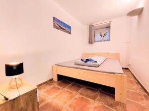 Posteľ alebo postele v izbe v ubytovaní Stilvolle Gartenterrassenwohnung mitten in Bregenz