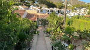 an aerial view of a village with houses at Casa Palmerita a 7 minutos andando de una playa de aguas cristalinas in Teulada