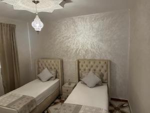 Rúm í herbergi á S&R Appartements