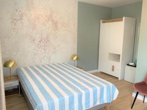 Postel nebo postele na pokoji v ubytování Pod Lipami