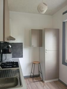 Kuchyň nebo kuchyňský kout v ubytování Appartement 2 hyper centre Lorient