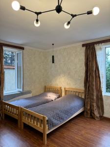 Letto o letti in una camera di Evergreen Surami Hotel